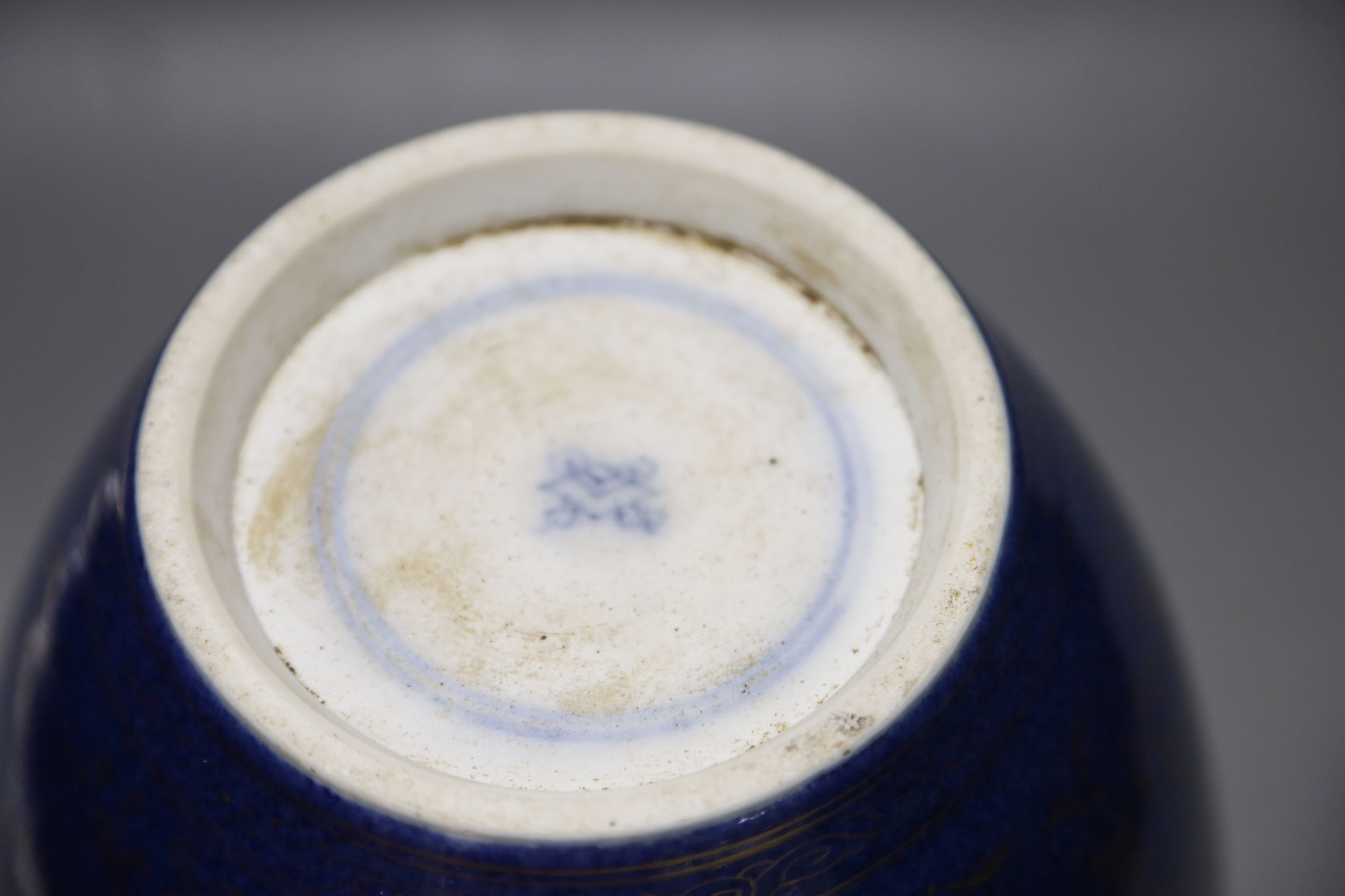 A Chinese Kangxi blue and white hundred antiques jar, 21cm, cracked, with hardwood stand and a Samson powder blue jar, 26cm, wear